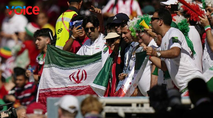 Iran government supporters confront protesters at World Cup