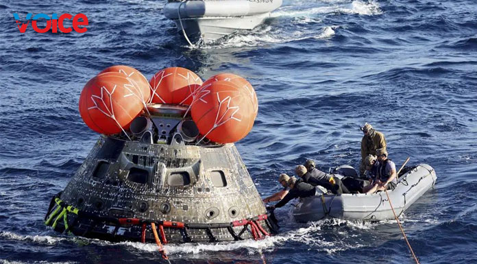NASA Orion capsule safely blazes back from moon, aces test